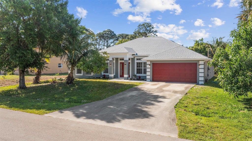 Photo of 1218 SW Melrose Avenue, Port Saint Lucie, FL 34953 (MLS # F10498767)