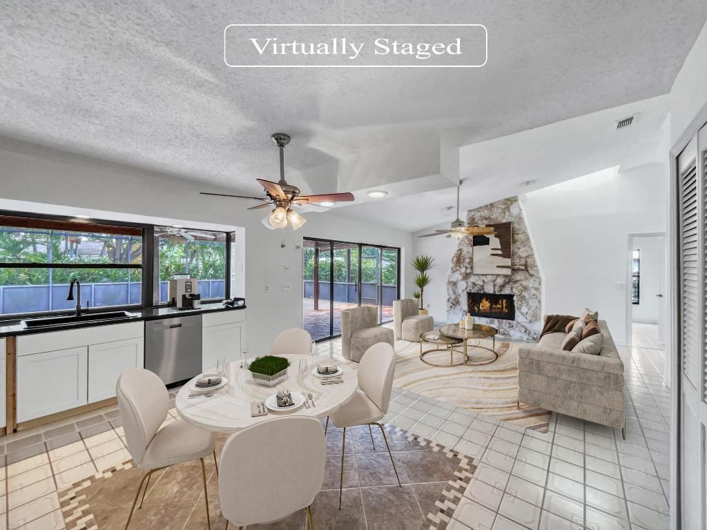 Photo of 1102 SE Mcfarlane Avenue, Port Saint Lucie, FL 34952 (MLS # R10969759)