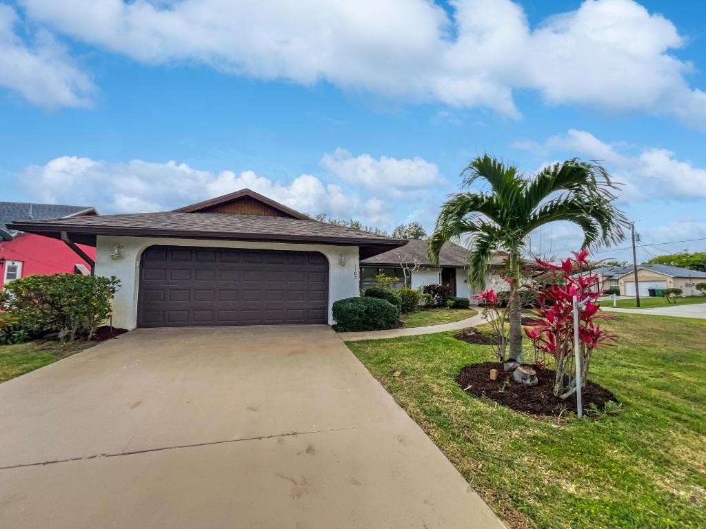 Photo of 1102 SE Mcfarlane Avenue, Port Saint Lucie, FL 34952 (MLS # R10969759)