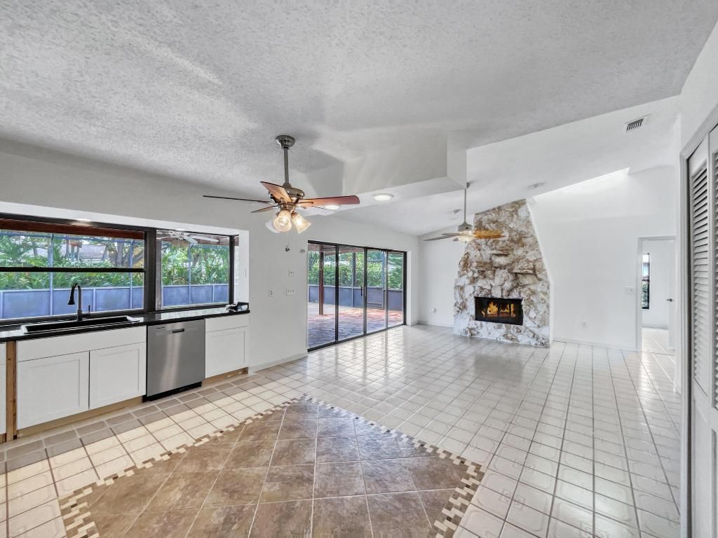 Photo of 1102 SE Mcfarlane Avenue, Port Saint Lucie, FL 34952 (MLS # R10969759)