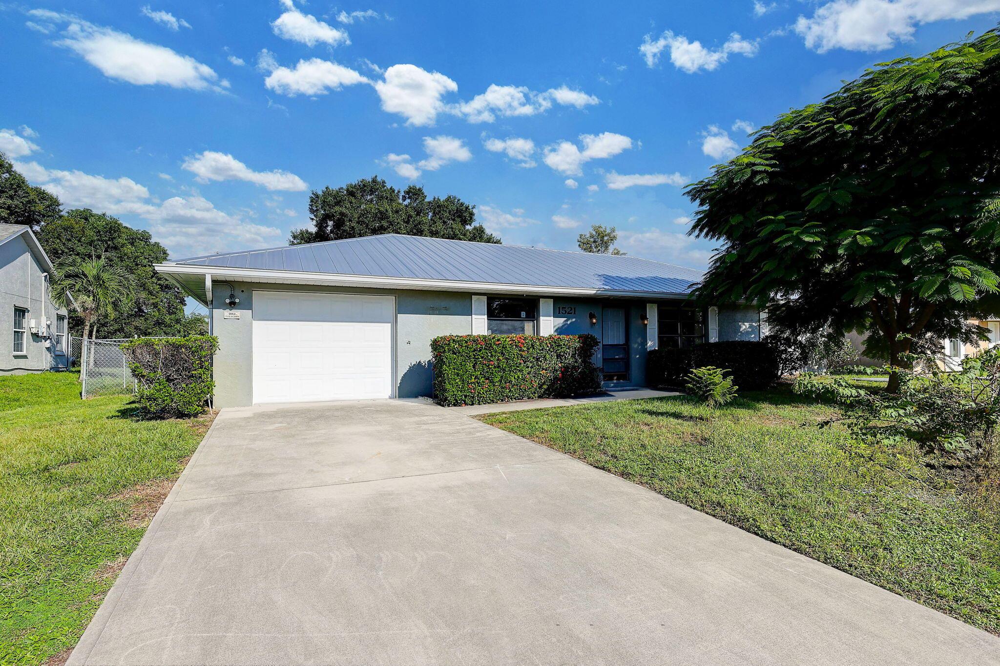 Experience the comfort of this beautiful 3 bedroom 2 bath partially furnished home in the heart of Port Saint Lucie. Available for a 6 month or a 12 month lease. The vaulted ceilings in this residence create an airy open feel in an already smart split bedroom layout. The spacious galley kitchen is ready for your culinary ideas, equipped with essential appliances to make cooking a breeze.The Florida room with climate control offers a tranquil retreat for morning coffee or evening unwinding. Step outside to a welcoming yard with ample space for your pet to explore or simply enjoy a quiet Florida afternoon. Located conveniently near Crosstown and the Airoso area, you will enjoy easy access to major highways, schools, hospitals and shopping centers. Available 10/1/25