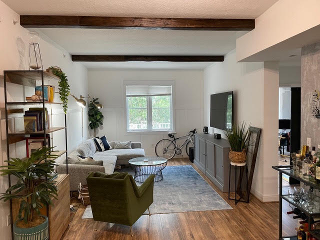 Bright open floor plan condo on 2nd floor with 2 bed/2 full bath in the heart of downtown Abacoa. This split floor plans features high ceilings, walk in shower, and oversized patio/balcony (approx 48sq-ft covered and 190sq-ft open)! Laminate wood flooring throughout with tile installed in bathrooms and kitchen. The kitchen includes a beautiful open floor plan with a beautiful extended butcher block countertop. Kitchen also includes open shelving concept with pullout drawers installed in cabinets to allow for more storage. Guest bedroom includes walk in closet with added shoe storage. Master bedroom also upgraded with additional storage. Unit comes with standup washer / dryer, along with patio storage and privacy fence.