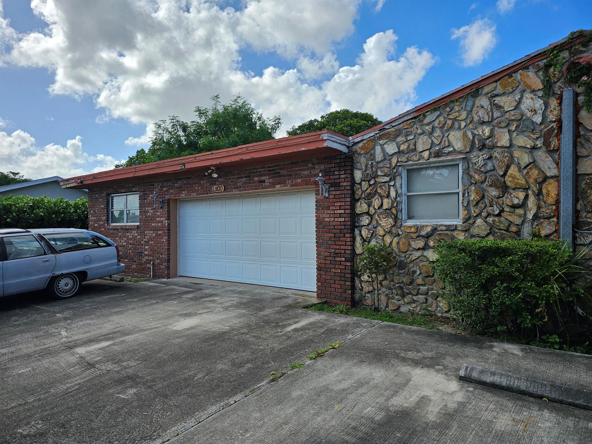 Investor Special - Cash Only! Triplex:- **Unit #1**: 3 bedrooms, 2 bathrooms, 2-car garage, currently rented below market for $1,200 per month.- **Unit #2**: 3 bedrooms, 2 bathrooms, needs a complete renovation and is currently vacant.- **Unit #3**: 1 bedroom, 1 bathroom, rented for $900 per month.This is a great investment opportunity!