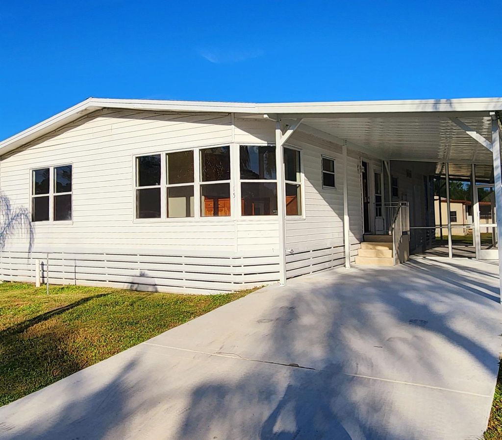 Photo of 15 SE Iberian Lane, Port Saint Lucie, FL 34952 (MLS # R11032262)