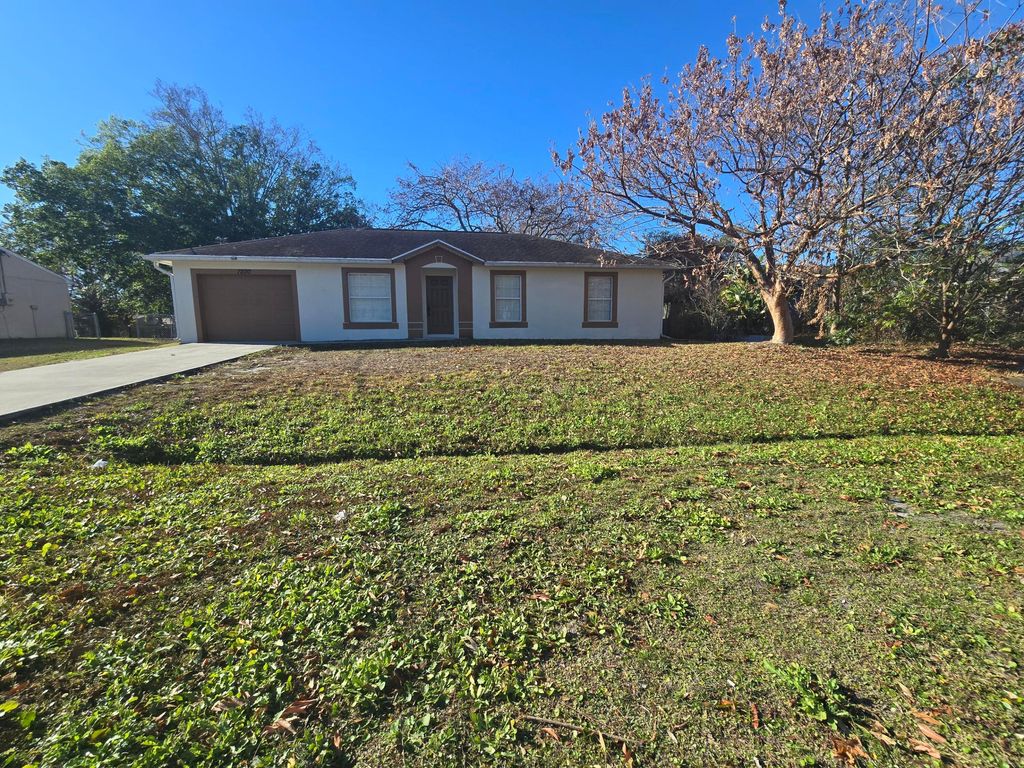 Photo of 1200 SW Sudder Avenue, Port Saint Lucie, FL 34953 (MLS # R11166776)