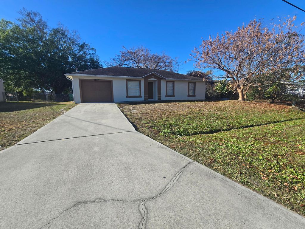Photo of 1200 SW Sudder Avenue, Port Saint Lucie, FL 34953 (MLS # R11166776)