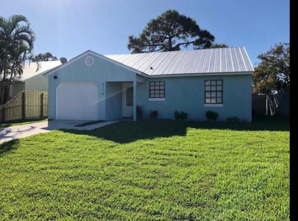 Photo of 5770 SE Wilsie Drive, Stuart, FL 34997 (MLS # R10709377)