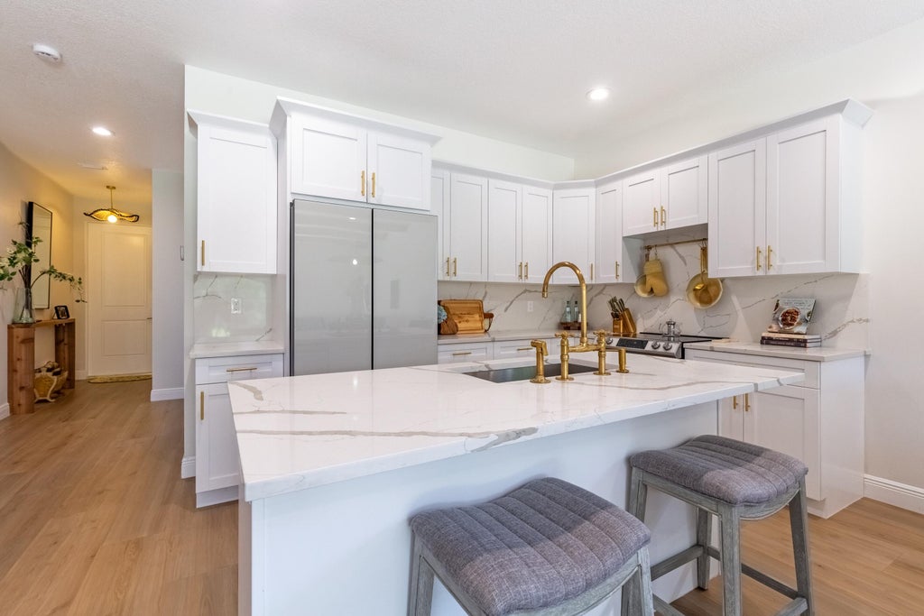 Photo of 5601 Papaya Road, West Palm Beach, FL 33413 (MLS # R11108666)