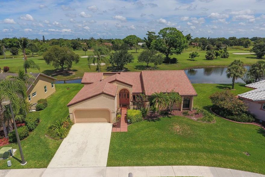 This is a one- of- a- kind home, great water view overlooking golf course. Prime Lot,.  Great elevation, ,Light a and Bright Home with an  Open Floor Plan, Vaulted Ceilings and exquisite atrium, saturating home with natural light. The home has a
barrel tile roof, accordion  shutters to keep you safe, a newer air conditioning system keeping you cool.