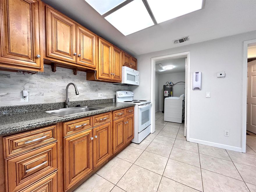 FRESHLY PAINTED AND UPGRADED 1 BR/1BA VILLA WITH PRIVATE FENCED IN PATIO!! BRAND NEW A/C! ALL AGES ARE WELCOMED. WIDE OPEN FLOOR PLAN, VAULTED CEILINGS, GRANITE COUNTER TOPS, NEUTRAL TILE IN LIVING AREA AND BRAND NEW FLOORS IN BEDROOM AND BATH. HUGE LAUNDRY ROOM WITH FULL SIZE WASHER/ DRYER AND PLENTY OF STORAGE SPACE. PRIVATE ENTRANCE. TONS OF PARKING. WATER INCLUDED. QUICK ASSOCIATION APPROVAL! 650 MINIMUM CREDIT SCORE. CONVENIENTLY LOCATED MINUTES FROM HIGHWAYS, RESTAURANTS, SHOPPING AND PLACES OF WORSHIP