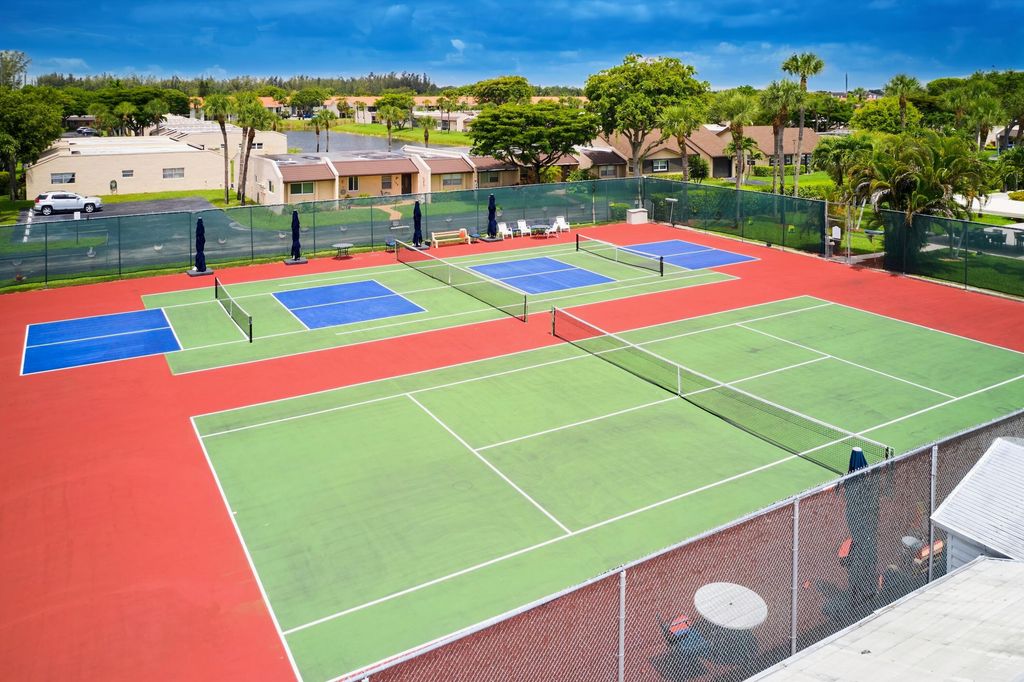 Photo of 175 Lake Susan Lane, West Palm Beach, FL 33411 (MLS # B26041312)
