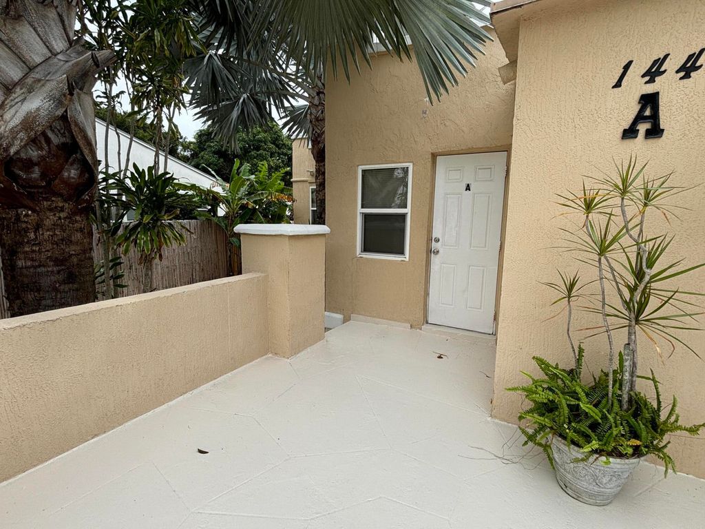 Photo of 144 Park Avenue #A, Lake Park, FL 33403 (MLS # R11022823)