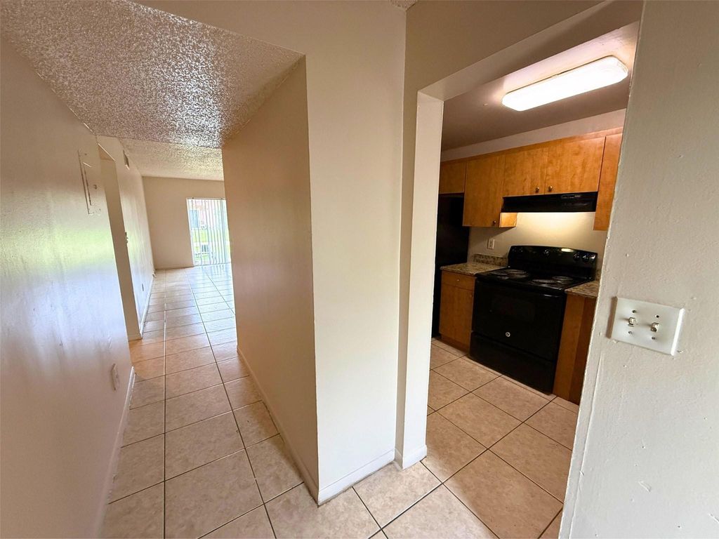 Photo of 2221 NW 58th Terrace #14, Lauderhill, FL 33313 (MLS # B26025449)