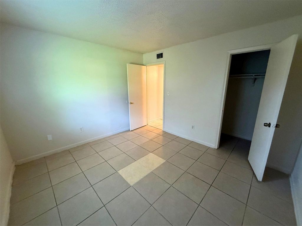 Photo of 2221 NW 58th Terrace #14, Lauderhill, FL 33313 (MLS # B26025449)