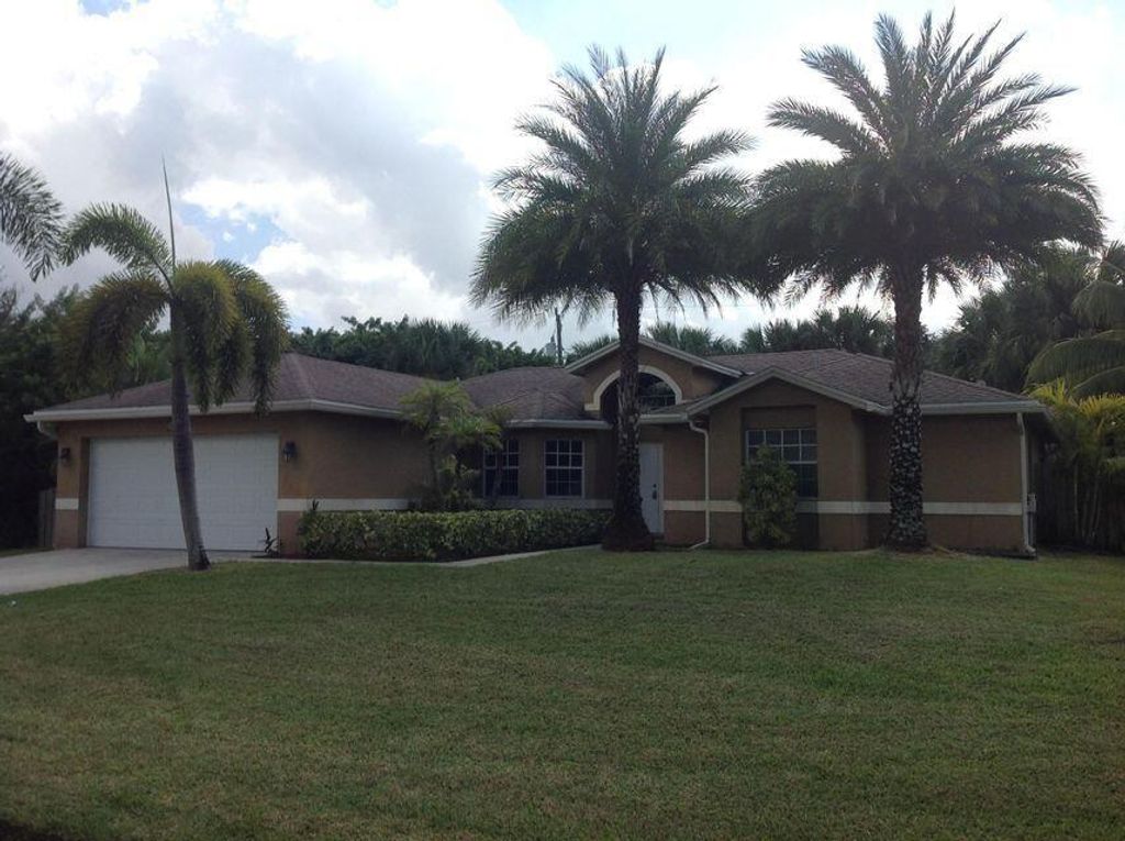Photo of 1516 SW Escobar Lane, Port Saint Lucie, FL 34953 (MLS # R10737774)