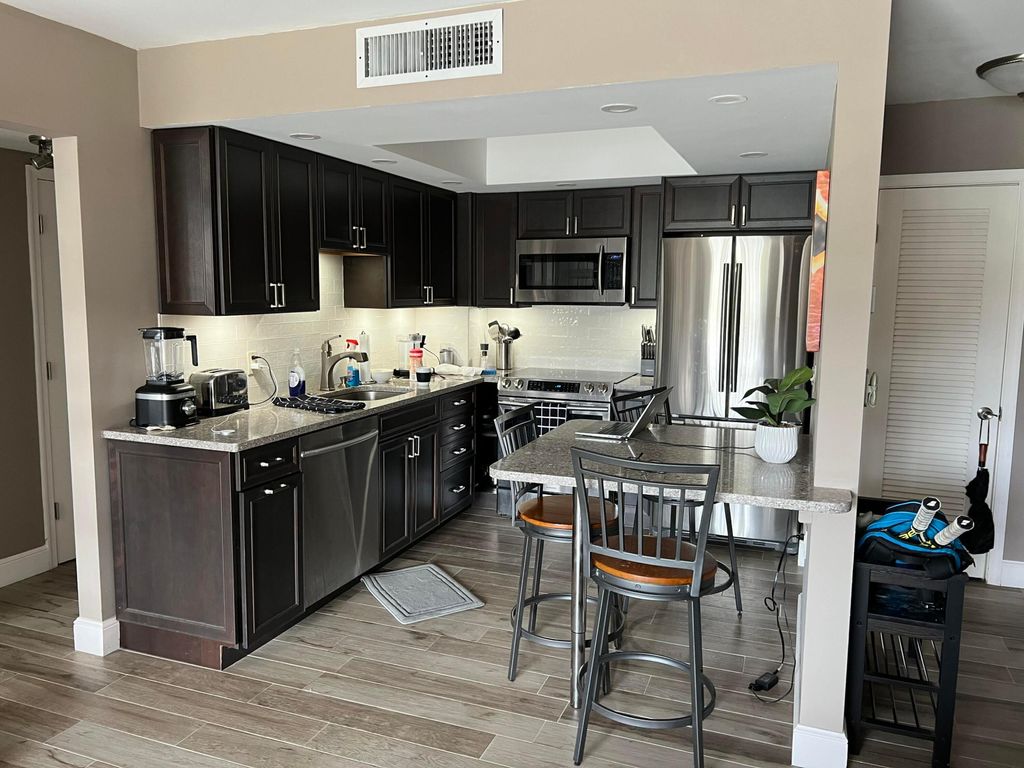 Photo of 630 Tennis Club Drive #206, Fort Lauderdale, FL 33311 (MLS # B26004894)