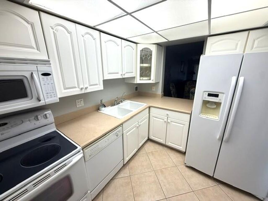 Photo of 10040 Meridian Way N #103, Palm Beach Gardens, FL 33410 (MLS # B26047665)