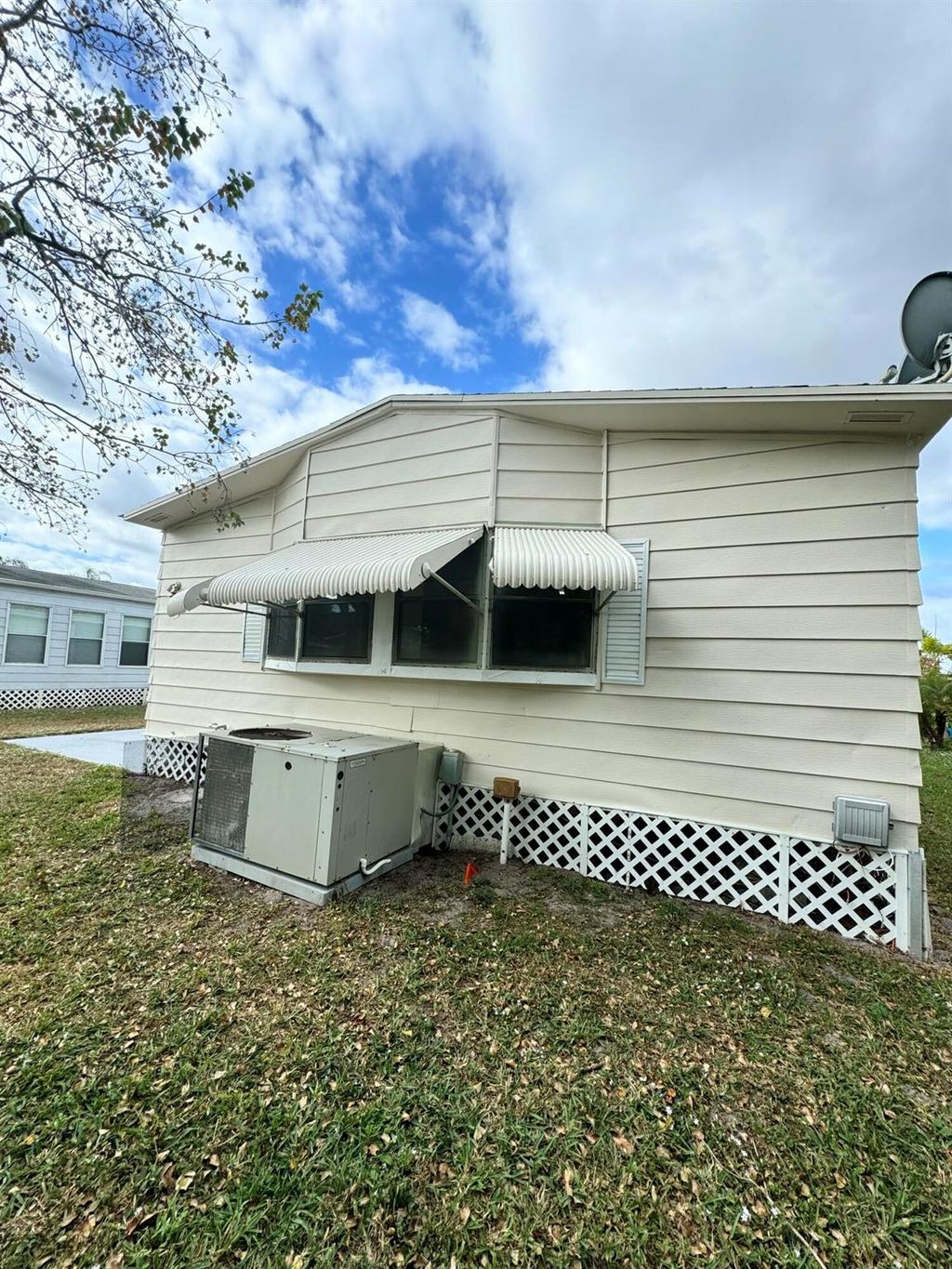 Photo of 85 Lagos Del Norte, Fort Pierce, FL 34951 (MLS # R11045439)