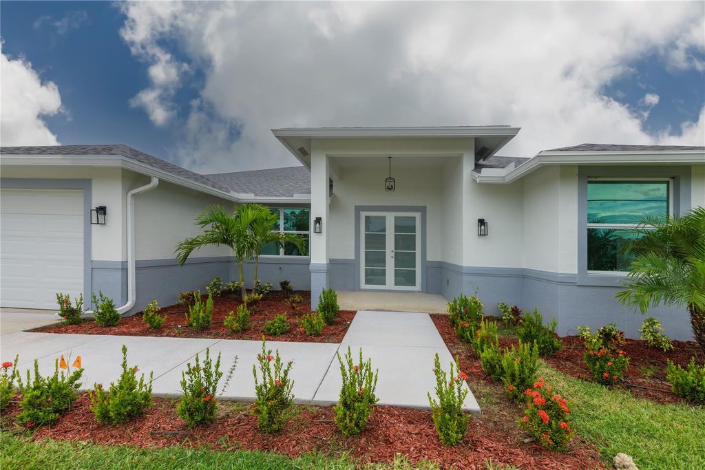 Photo of 2470 SW Webster Ln, Port St Lucie, FL 34953 (MLS # F10401966)