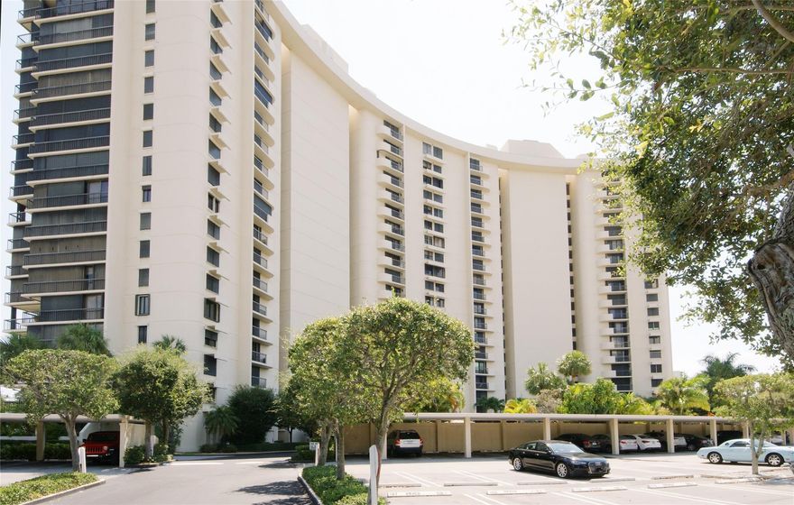 Welcome to The Envoy, where refined luxury meets resort-style living. This spacious 2-bedroom, 2-bath condo offers panoramic views from a wide balcony overlooking Banyan Cay and Lake Mangonia. Featuring new storm impact windows and sliding doors, engineered wood floors, an oversized walk-in shower, and a separate laundry room with extra storage. Enjoy full-service amenities: 24-hour doorman, on-site manager, pool with spa, fitness center, tennis courts, and a stylish social room. Ideally located in the gated Lands of the President next to the renovated Dutchman's Pipe Golf Course, the new Belgrove Hotel, and near beaches, shopping, cultural venues, PB Airport, I-95 and the Florida Turnpike.