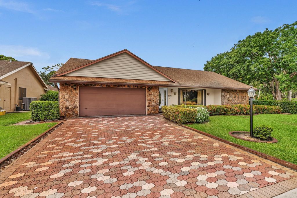 Photo of 5035 Whitewood Cove N, Lake Worth, FL 33467 (MLS # R11113462)