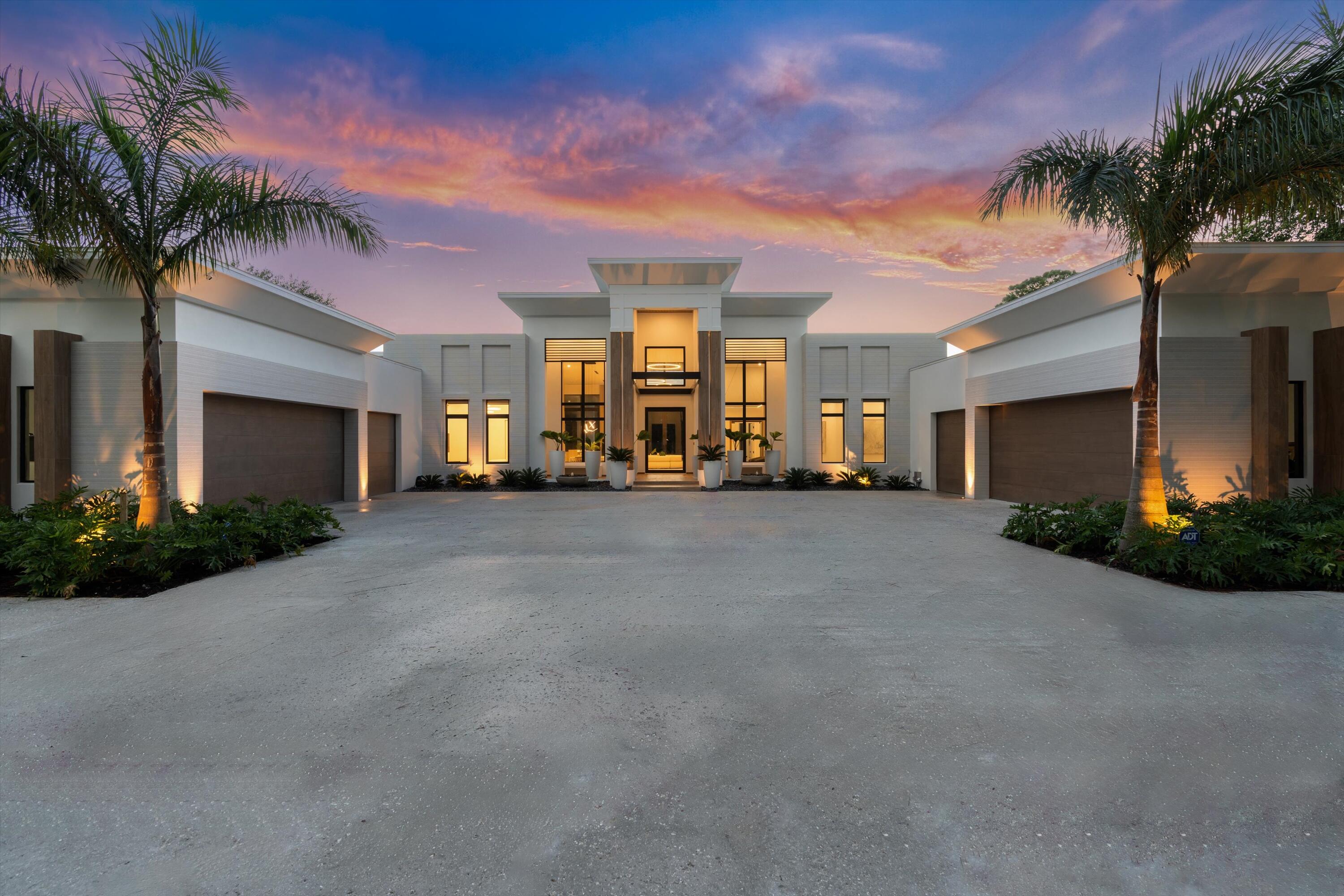 Presenting an extraordinary new construction (2024) masterpiece situated on over an acre (1.15 acres), this ultra-luxury estate offers 12,513 square feet under roof, with 7,602 square feet of meticulously designed living space under air with 8-car garage. This home is a harmonious blend of opulence and state-of-the-art engineering and is offered decorator-furnished. The entry and formal living areas are filled with natural light, highlighting the impressive 24-foot ceilings.This five-bedroom, seven-and-a-half-bathroom residence features ensuite bedrooms, four air conditioners, and two water heaters, ensuring year-round comfort. The expansive living areas include an elegant office, a sophisticated club room, and a 120-bottle wine room, perfect for entertaining and relaxation.