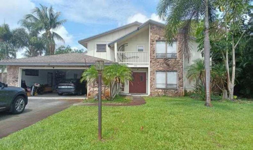 Photo of 596 Greenwood Drive, Jupiter, FL 33458 (MLS # B26049240)