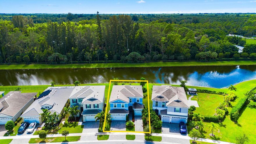 Welcome to this stunning Poinciana model located in the highly sought-after Groves community of Westlake, Florida. This impressive two-story home offers 4 bedrooms PLUS a loft, 3.5 bathrooms, and a 3-car garage across nearly 3,000 square feet of beautifully designed living space. From the moment you arrive, you're greeted by elegant double entry doors and full impact windows throughout, providing both beauty and peace of mind.