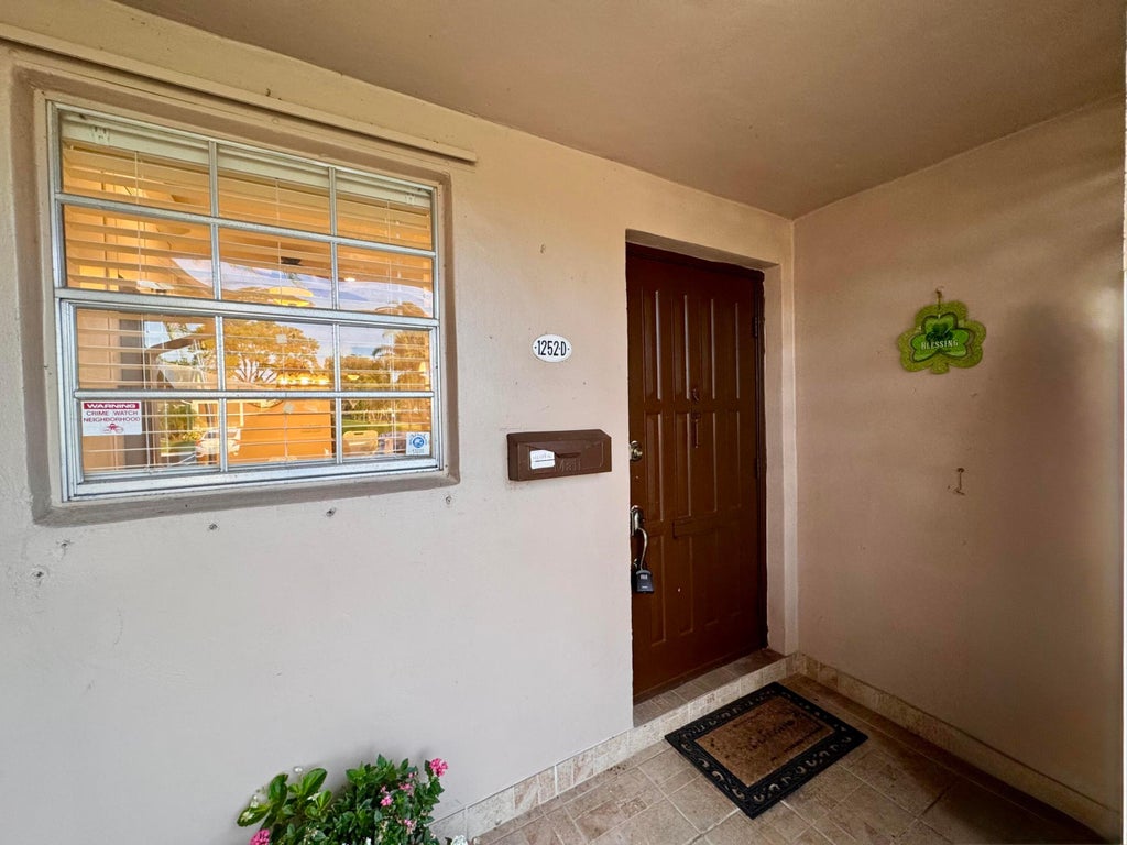 Photo of 1252 Club Drive W #D, Delray Beach, FL 33445 (MLS # B26035426)