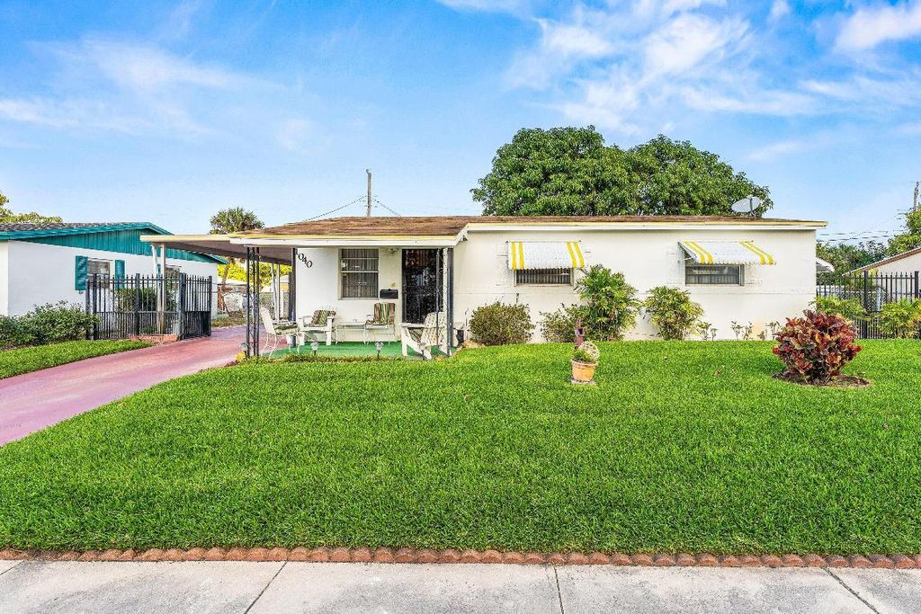 Photo of 1040 W 1st Street, Riviera Beach, FL 33404 (MLS # R11157636)