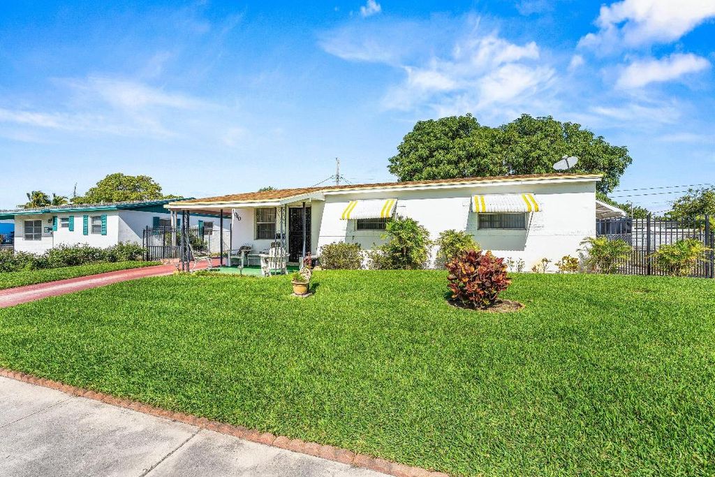 Photo of 1040 W 1st Street, Riviera Beach, FL 33404 (MLS # R11157636)
