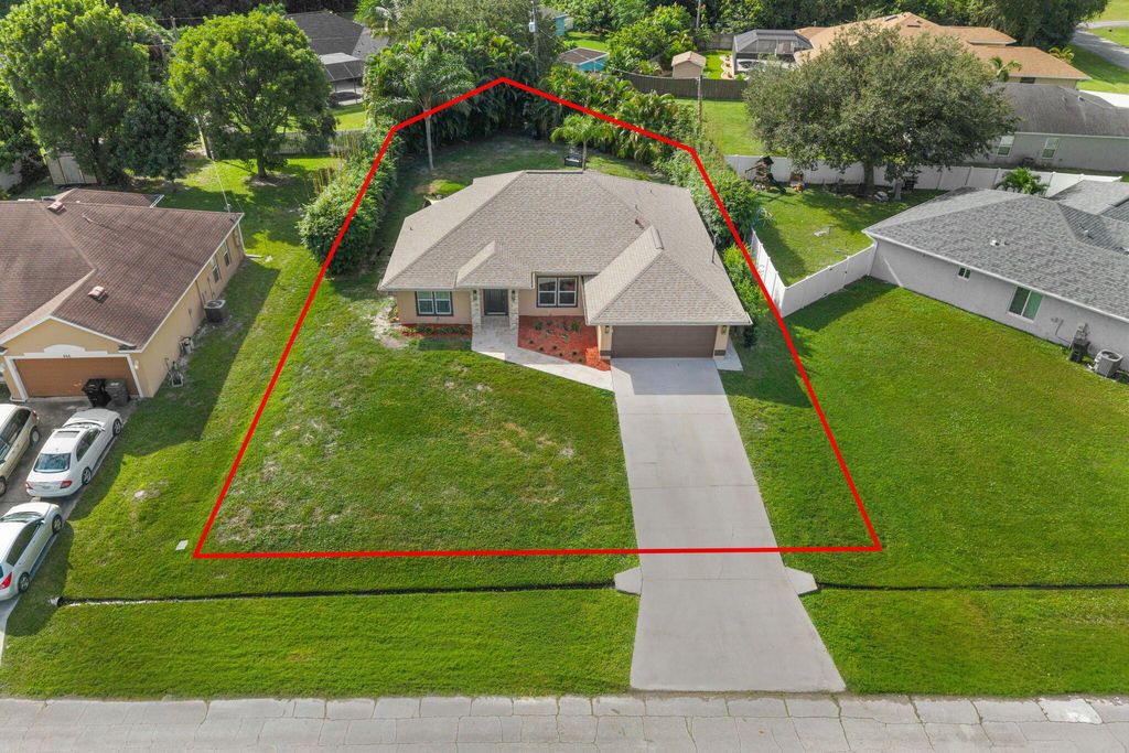 Photo of 474 SW Homeland Road, Port Saint Lucie, FL 34953 (MLS # R11133817)