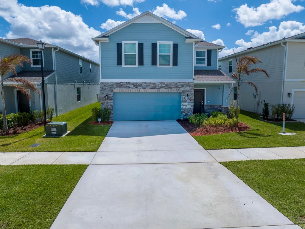 Photo of 12574 SW Forli Way, Port Saint Lucie, FL 34987 (MLS # B26006472)
