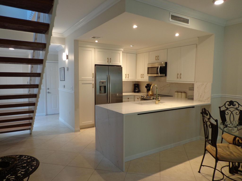 Photo of 11771 Saint Andrews Place #106, Wellington, FL 33414 (MLS # R10913974)