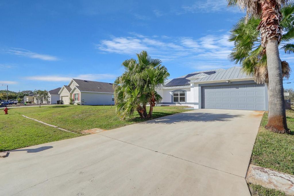 Photo of 551 SW Lawler Avenue, Port Saint Lucie, FL 34953 (MLS # R10958669)
