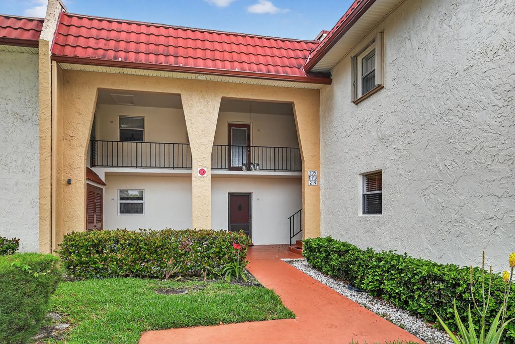 Photo of 211 Lake Dora Drive, West Palm Beach, FL 33411 (MLS # B26012450)