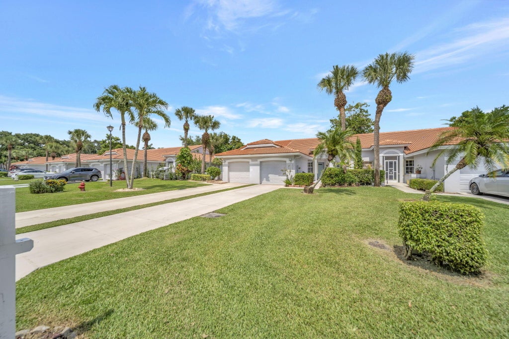 Photo of 15136 W TRANQUILITY LAKE Drive, Delray Beach, FL 33446 (MLS # B26079161)