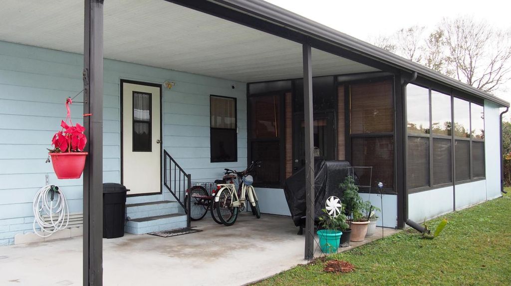 Photo of 8461 Florence Drive, Port Saint Lucie, FL 34952 (MLS # R10948003)