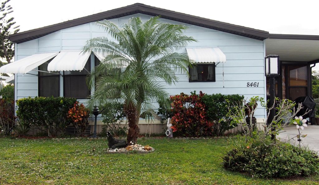 Photo of 8461 Florence Drive, Port Saint Lucie, FL 34952 (MLS # R10948003)