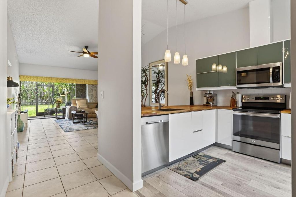 Photo of 1032 E Lakes Drive, Deerfield Beach, FL 33064 (MLS # R11153212)
