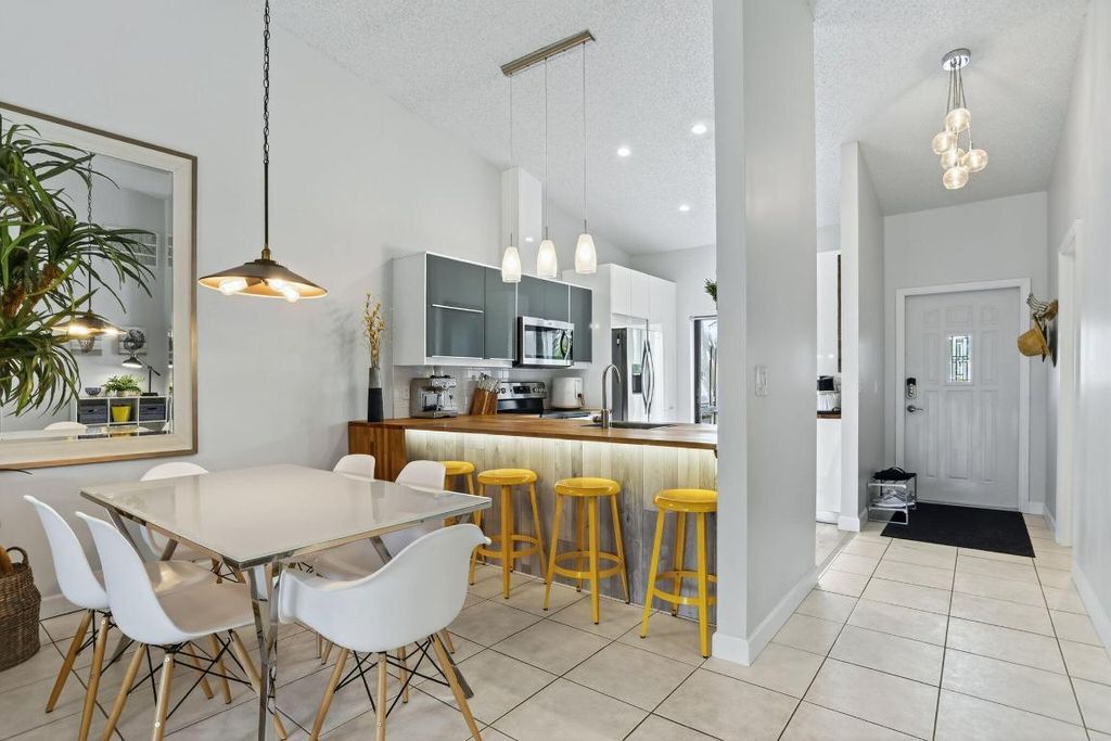Photo of 1032 E Lakes Drive, Deerfield Beach, FL 33064 (MLS # R11153212)