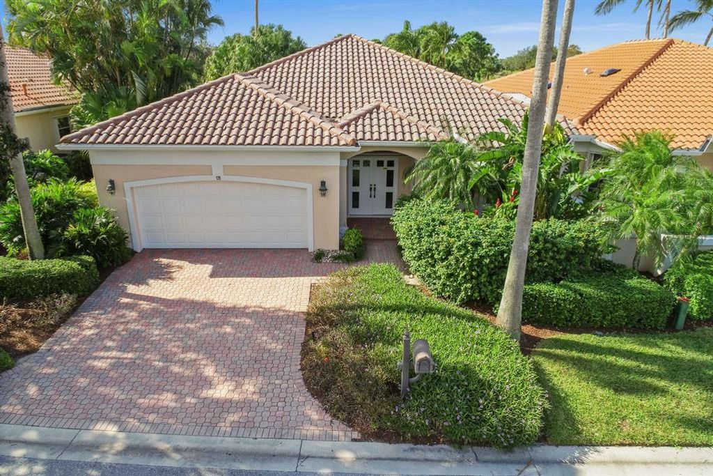 Photo of 128 Golf Village Boulevard, Jupiter, FL 33458 (MLS # R10675971)