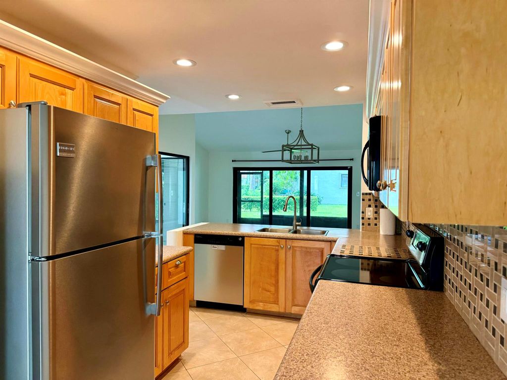 Photo of 6938 Escobar Court #3, Boca Raton, FL 33433 (MLS # R11017743)