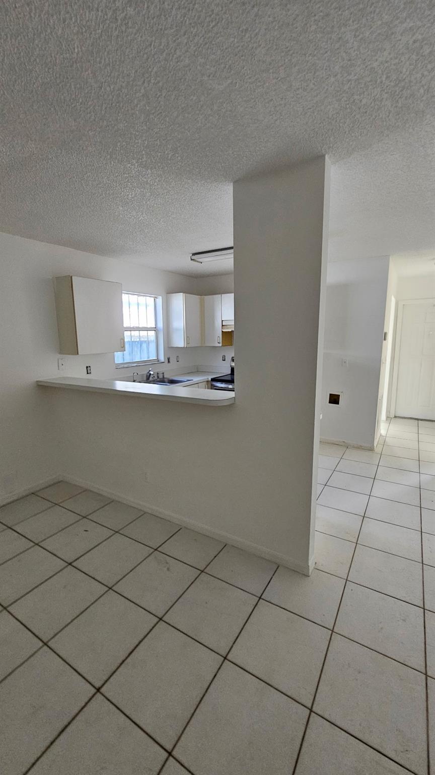 4BR/2BA single-family home priced well below market! A true fixer-upper with great bones — perfect for investors or buyers ready to customize and add value. Spacious layout, large lot, and endless potential. Close to schools, parks, shopping, and highways. Own for a fraction of the price and make it your own