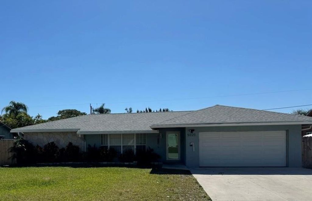 Photo of 5020 NW 77th Court, Pompano Beach, FL 33073 (MLS # F10425537)