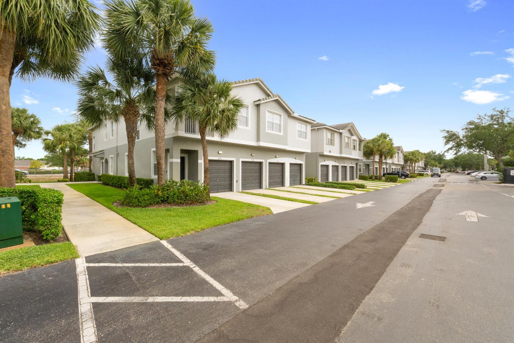 Photo of 3030 Grandiflora Drive, Greenacres, FL 33467 (MLS # R11102807)