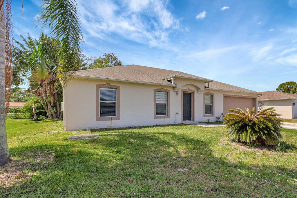 Photo of 1144 SW Ithaca Street, Port Saint Lucie, FL 34983 (MLS # R10970198)