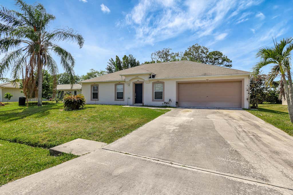 Photo of 1144 SW Ithaca Street, Port Saint Lucie, FL 34983 (MLS # R10970198)