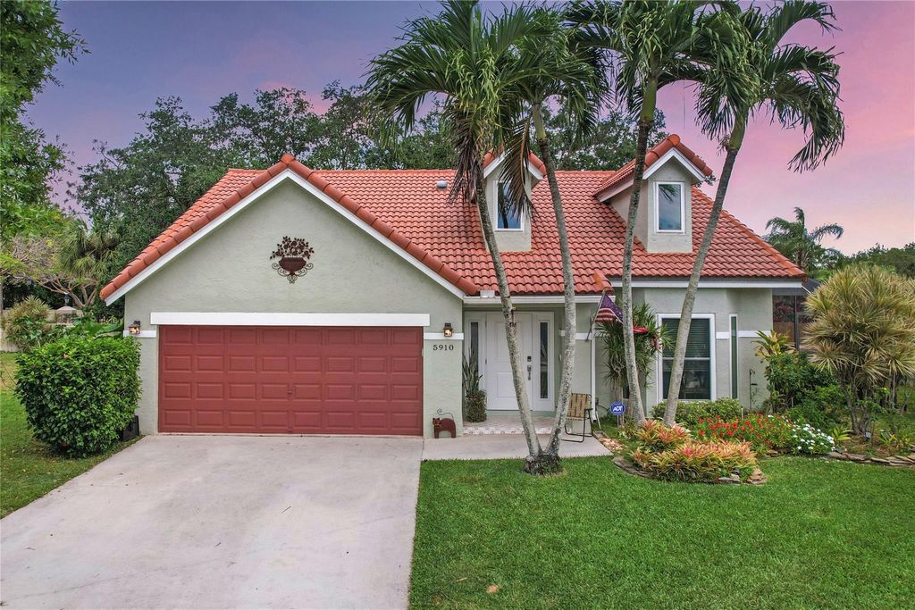 Photo of 5910 NW 65th Court, Parkland, FL 33067 (MLS # F10432854)