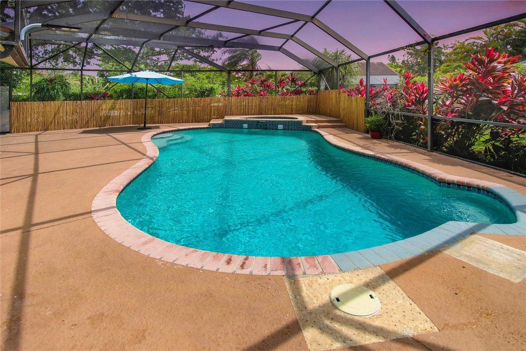 Photo of 5910 NW 65th Court, Parkland, FL 33067 (MLS # F10432854)